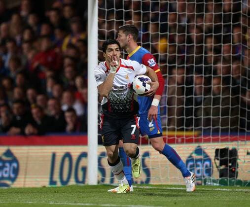 Liverpool s Luis Suarez celebrates scoring his sides third goal Crystal Palace vs FC Liverpool - Barclays Premier League - Selhurst Park - London - UK - 05 05 2014 - EDITORIAL USE ONLY. No use with unauthorised audio, video, data, fixture lists, club league logos or live services. Online in-match use limited to 120 images, no video emulation. No use in betting, games or single club league player publications.
