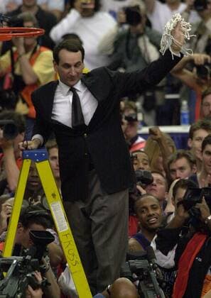 March 11, 2001 - U.S. - KRT SPORTS STORY SLUGGED: DUKE-NCAROLINA KRT PHOTOGRAPH BY BEN GRAY ATLANTA JOURNAL CONSTITUTION (March 11) ATLANTA, GEORGIA-- Duke s head coach Mike Krzyzewski holds up the basketball net after cutting it down following his teams victory over North Carolina at Sunday s ACC tournament March 11, 2001 at the Georgia Dome against North Carolina. No. 3 Duke beat No. 6 North Carolina 79-53 and faces No. 16 Monmouth in the first round of the NCAA College League USA Tournament Thursday March 15. North Carolina will face Princeton. (AJC) PL KD BL 2001 (Vert) (lde) -- NO MAGS, NO SALES News Archive - March 11, 2001 - ZUMAm67