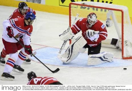 Left to right: Morgan Rielly (CAN), Jaromir Jagr (CZE) and goalkeeper James Reimer (CAN) during the Group A match Czech Republic vs. Canada at the Ice Hockey World Championship, in Minsk, Belarus, May 12, 2014. (CTKxPhotoxMichalxKamaryt) CTKPhotoOF201405121040201  kmt 4