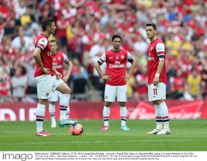 Arsenal s Mesut Özil looks on dejected after going 1-0 down Arsenal vs Hull City- FA Cup Final 2014 - Wembley Stadium - London - UK - 17 05 2014 - Pic David Klein Sportimage EDITORIAL USE ONLY. No use with unauthorised audio, video, data, fixture lists, club league logos or live services. Online in-match use limited to 120 images, no video emulation. No use in betting, games or single club league player publications.