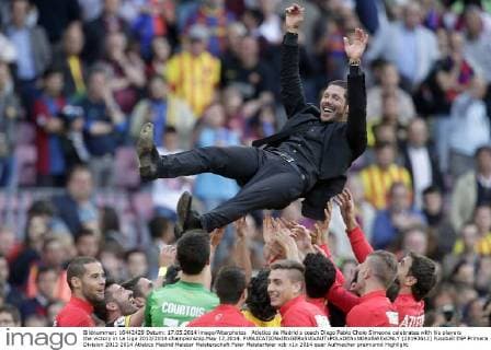 Atletico de Madrid s coach Diego Pablo Cholo Simeone celebrates with his players the victory in La Liga 2013 2014 championship.May 17,2014.  (20193612)