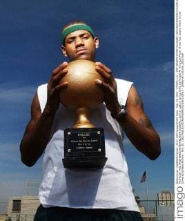 Feb. 25, 2002 - STAMP, U.S. - KRT SPORTS STORY SLUGGED: BKN-BLACKSTONE-COLUMN KRT PHOTO BY PHIL MASTURZO AKRON BEACON JOURNAL (June 5) LeBron James holds his Parade All-American Player of the Year award. (Vert) (mvw) (Diversity) News Archive - Feb. 25, 2002 - ZUMAm67