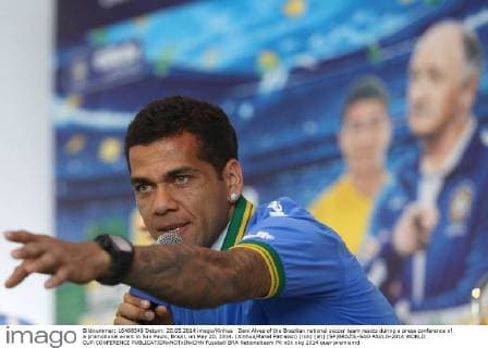 Dani Alves of the Brazilian national soccer team reacts during a press conference of a promotional event in Sao Paulo, Brazil, on May 20, 2014. (Xinhua Rahel Patrasso) (ron) (ah) (SP)BRAZIL-SAO PAULO-2014 WORLD CUP-CONFERENCE 