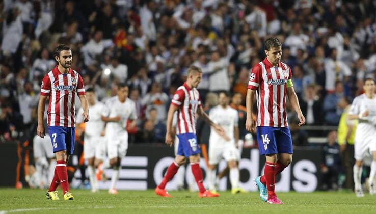 Adrian Lopez (Atletico Madrid 7) and Gabi (Atletico Madrid 14) upset after the goal of Sergio Ramos (Real Madrid CF 4) during the final of the Champions league between Real Madrid and Atletico Madrid, Estadio da Luz in Lisbon on May 24., 2014. Real Madrid gegen Atletico Madrid im Finale der Champions League, Saison 2013 2014 am 24. Mai 2014.