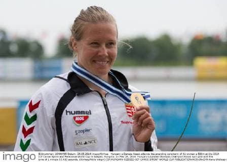 Hungary s Danuta Kozak attends the awarding ceremony of K1 women s 500m at the 2014 ICF Canoe Sprint and Paracanoe World Cup in Szeged, Hungary, on May 24, 2014. Hungary s London Olympics Champion Kozak won gold with the time of 1 minute 53.433 seconds. (Xinhua Attila Volgyi) (SP)HUNGARY-SZEGED-ICF-CANOE SPRINT-WORLD CUP 