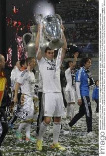 Real Madrid s Gareth Bale celebrates with supporters after winning the UEFA Champions League 2014, at Santiago Bernabeu stadium. 