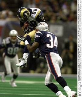 Feb. 3, 2002 - U.S. - KRT SPORTS STORY SLUGGED: SUPERBOWL KRT PHOTOGRAPH BY JOE LEDFORD KANSAS CITY STAR (February 3) NEW ORLEANS, LA - St. Louis wide receiver Torry Holt (88) pulls in a pass as he is hit by New England s Tebucky Jones (34) during the first quarter of Super Bowl XXXVI at the Louisiana Superdome, Sunday, February 3, 2002. (KC) NC KD BL 2002 (Vert) (Digital image) (smd) News Archive - Feb. 3, 2002 - ZUMAm67