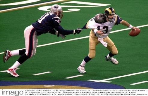 Feb. 3, 2002 - U.S. - KRT SPORTS STORY SLUGGED: SUPERBOWL KRT PHOTOGRAPH BY TERRY GILLIAM (February 3) NEW ORLEANS, LA - St. Louis quarterback Kurt Warner (13) is sacked by New England s Bobby Hamilton (91) at end of first quarter of Super Bowl XXXVI at the Louisiana Superdome, Sunday, February 3, 2002. (KRT) NC KD BL 2002 (Horiz) (Digital image) (smd) News Archive - Feb. 3, 2002 - ZUMAm67