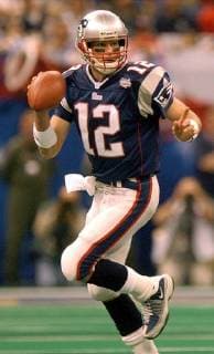 Feb. 3, 2002 - U.S. - KRT SPORTS STORY SLUGGED: SUPERBOWL KRT PHOTOGRAPH BY BOB BREIDENBACH PROVIDENCE JOURNAL (February 3) NEW ORLEANS, LA - New England quarterback Tom Brady looks for room to pass the ball in the second quarter of Super Bowl XXXVI at the Louisiana Superdome, Sunday, February 3, 2002. (PJ) NC KD BL 2002 (Vert) (Digital image) (smd) -- NO MAGS, NO SALES News Archive - Feb. 3, 2002 - ZUMAm67