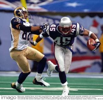 Feb. 3, 2002 - U.S. - KRT SPORTS STORY SLUGGED: SUPERBOWL KRT PHOTOGRAPH BY DAVID PURDY BILOXI SUN HERALD (February 3) NEW ORLEANS, LA - New England s Jeff Robinson (45) fights to get away from St. Louis wide reciever Torry Holt (88) after Robinson intercepted a pass in the third quarter of Super Bowl XXXVI at the Louisiana Superdome, Sunday, February 3, 2002. (BI) NC KD BL 2002 (Sq) (Digital image) (smd) News Archive - Feb. 3, 2002 - ZUMAm67