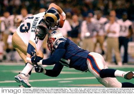 Feb. 3, 2002 - U.S. - KRT SPORTS STORY SLUGGED: SUPERBOWL KRT PHOTOGRAPH BY MARY MURPHY PROVIDENCE JOURNAL (February 3) NEW ORLEANS, LA - New England defender Bobby Hamilton (91) sacks Rams quarterback Kurt Warner during the Patriots 20-17 victory over the Rams in Super Bowl XXXVI at the Louisiana Superdome, Sunday, February 3, 2002. (PJ) NC KD BL 2002 (Horiz) (Digital image) (smd) -- NO MAGS, NO SALES News Archive - Feb. 3, 2002 - ZUMAm67