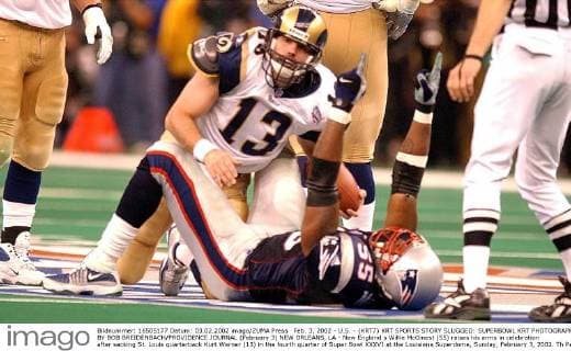 Feb. 3, 2002 - U.S. - (KRT7) KRT SPORTS STORY SLUGGED: SUPERBOWL KRT PHOTOGRAPH BY BOB BREIDENBACH PROVIDENCE JOURNAL (February 3) NEW ORLEANS, LA - New England s Willie McGinest (55) raises his arms in celebration after sacking St. Louis quarterback Kurt Warner (13) in the fourth quarter of Super Bowl XXXVI at the Louisiana Superdome, Sunday, February 3, 2002. Th Patriots won 20-17. (PJ) AP NC KD BL 2002 (Horiz) (Digital image) (smd) (Additional photos available on KRT Direct, KRT NewsCom or upon request) -- NO MAGS, NO SALES News Archive - Feb. 3, 2002 - ZUMAm67