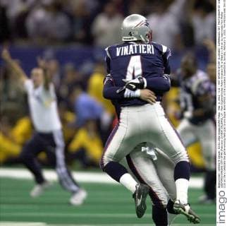 Feb. 3, 2002 - U.S. - KRT SPORTS STORY SLUGGED: SUPERBOWL KRT PHOTOGRAPH BY JOE LEDFORD KANSAS CITY STAR (February 3) NEW ORLEANS, LA - New England kicker Adam Vinatieri (4) is lifted in t the air by teammate Ken Walter (13) as the y celebrate the game-winning field goal to win Super Bowl XXXVI at the Louisiana Superdome, Sunday, February 3, 2002. The Patriots beat the St. Louis Rams 20-17. (KC) NC KD BL 2002 (Vert) (Digital image) (smd) News Archive - Feb. 3, 2002 - ZUMAm67