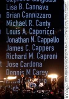 Feb. 3, 2002 - U.S. - KRT SPORTS STORY SLUGGED: SUPERBOWL KRT PHOTOGRAPH BY PATRICK SCHNEIDER CHARLOTTE OBSERVER (February 3) NEW ORLEANS, LA - Victims names of the September 11th terrorist attacks are displayed behind the band U2 during the Super Bowl XXXVI halftime show at the Louisiana Superdome, Sunday, February 3, 2002. (CH) NC KD BL 2002 (Vert) (Digital image) (smd) News Archive - Feb. 3, 2002 - ZUMAm67
