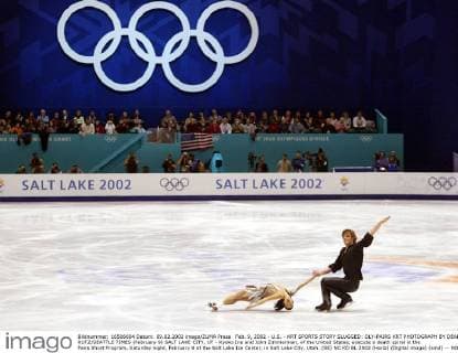 Feb. 9, 2002 - U.S. - KRT SPORTS STORY SLUGGED: OLY-PAIRS KRT PHOTOGRAPH BY DEAN RUTZ SEATTLE TIMES (February 9) SALT LAKE CITY, UT - Kyoko Ina and John Zimmerman, of the United States, execute a death spiral in the Pairs Short Program, Saturday night, February 9 at the Salt Lake Ice Center, in Salt Lake City, Utah. (SE) NC KD BL 2002 (Horiz) (Digital image) (smd) -- NO MAGS, NO SALES News Archive - Feb. 9, 2002 - ZUMAm67