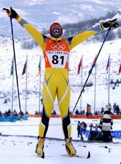 Feb. 13, 2002 - U.S. - KRT SPORTS STORY SLUGGED: OLY-XU.S. KRT PHOTOGRAPH BY VICKI VALERIO PHILADELPHIA INQUIRER (February 14) SOLDIER HOLLOW, UT-- The last place finisher in the Men s 10km Classical, Isaac Menyoli of Cameroon, raises his arms in triumph as he glides through the finish line at Cross Country Skiing in Soldier Hollow, Utah, Thursday February 14, 2002. (PH) NC KD BL 2002 (Vert) (lde) News Archive - Feb. 13, 2002 - ZUMAm67