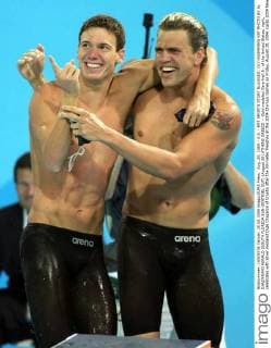 Aug. 20, 2004 - U.S. - KRT SPORTS STORY SLUGGED: OLY-SWIMMING KRT PHOTO BY AL DIAZ MIAMI HERALD (SOUTH FLORIDA SUN-SENTINEL OUT) (August 20) ATHENS GREECE -- Gold medalist Gary Hall Jr. of the United States, right, celebrates with silver medalist Duje Draganja of Croatia after the 50-meter freestyle at the 2004 Olympic Games on Friday, August 20, 2004. (gsb) 2004 News Archive - Aug. 20, 2004 - ZUMAm67