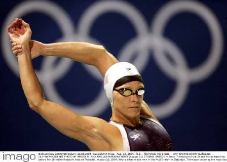 Aug. 20, 2004 - U.S. - NO MAGS, NO SALES -- KRT SPORTS STORY SLUGGED: OLY-SWIMMING KRT PHOTO BY SMILEY N. POOL DALLAS MORNING NEWS (August 21) ATHENS, GREECE -- Jenny Thompson of the United States stretches before her 50-meter freestyle heat on Thursday, August 20, 2004. With a silver medal won in the 4x100 relay on Saturday, Thompson becomes the most decorated swimmer in Olympic history with 12 medals. (gsb) 2004 News Archive - Aug. 20, 2004 - ZUMAm67