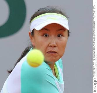 Shuai Peng of China watches the ball during her French Open women s first round match at Roland Garros in Paris on May 27, 2014.  PAR20140527730
