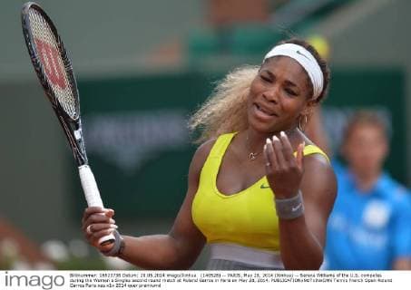 (140528) -- PARIS, May 28, 2014 (Xinhua) -- Serena Williams of the U.S. competes during the Women s Singles second round match at Roland Garros in Paris on May 28, 2014. 