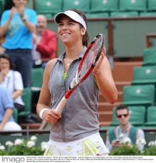Ajla Tomljanovic of Croatia looks into the crowd after winning her French Open women s third round match at Roland Garros in Paris on May 30, 2014.  PAR20140530717