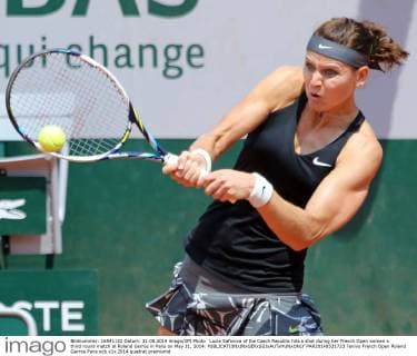 Lucie Safarova of the Czech Republic hits a shot during her French Open women s third round match at Roland Garros in Paris on May 31, 2014.  PAR20140531723