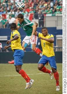 31 May 2014: Mexico forward Javier Hernandez (14) attempts a header on a corner kick during the international soccer friendly match between the Mexico and Ecuador National Teams at AT&T Stadium in Arlington, TX. Mexico defeats Ecuador 3-1. SOCCER: MAY 31 Ecuador v Mexico Icon0488 EDITORIAL USE ONLY