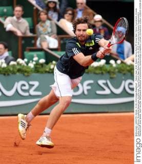 French Open 2014, Roland Garros,Paris,ITF Grand Slam Tennis Tournament, Ernests Gulbis (LAT),Aktion, Einzelbild,Ganzkörper,Hochformat,