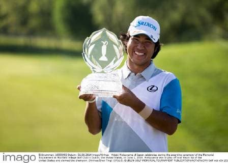 Hideki Matsuyama of Japan celebrates during the awarding ceremony of the Memorial Tournament at Muirfield Village Golf Club in Dublin, the United States, on June 1, 2014. Matsuyama won in play off over Kevin Na of the United States and claimed the champion. (Xinhua Shen Ting) (SP)U.S.-DUBLIN-GOLF-MEMORIAL TOURNAMENT 