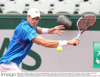 French Open 2014, Roland Garros,Paris,ITF Grand Slam Tennis Tournament, John Isner (USA),Aktion, Einzelbild,Halbkörper, Querformat,