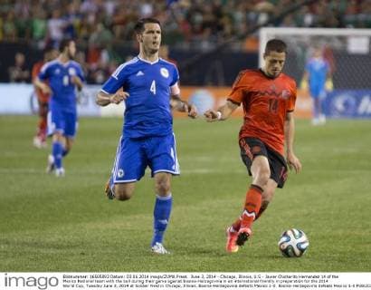 June 3, 2014 - Chicago, Illinois, U.S - Javier Chicharito Hernandez 14 of the Mexico National team with the ball during their game against Bosnia-Herzegovina in an international friendly in preparation for the 2014 World Cup, Tuesday June 3, 2014 at Soldier Field in Chicago, Illinois. Bosnia-Herzegovina defeats Mexico 1-0. Bosnia-Herzegovina defeats Mexico 1-0  - ZUMAp12