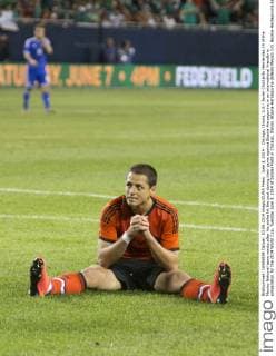 June 3, 2014 - Chicago, Illinois, U.S - Javier Chicharito Hernandez 14 of the Mexico National team reacts after his strike hit the post during their game against Bosnia-Herzegovina in an international friendly in preparation for the 2014 World Cup, Tuesday June 3, 2014 at Soldier Field in Chicago, Illinois. Bosnia-Herzegovina defeats Mexico 1-0. Bosnia-Herzegovina defeats Mexico 1-0  - ZUMAp12