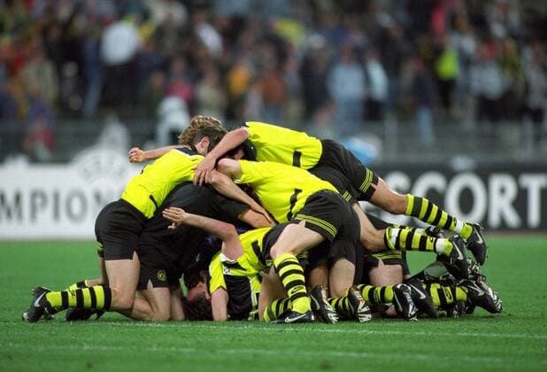 Fussball, Herren, Saison 96 97, UEFA-Champions-League Finale, im Olympia-Stadion München: Bor. Dortmund - Juventus Turin 3:1; Schlussjubel BVB, v.li.u.a.: Michael Zorc (BVB), Rene Tretschock (BVB), Paul Lambert (BVB), Jörg Heinrich (BVB). Jubel, Freude, Aktion.