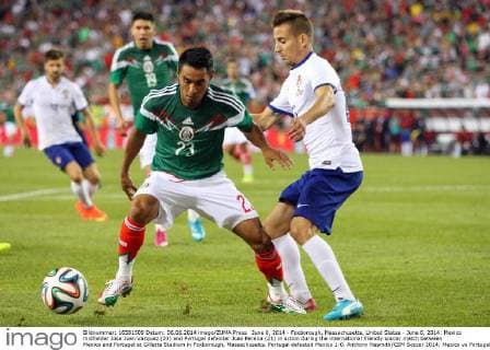 June 6, 2014 - Foxborough, Massachusetts, United States - June 6, 2014: Mexico midfielder Jose Juan Vazquez (23) and Portugal defender Joao Pereira (21) in action during the international friendly soccer match between Mexico and Portugal at Gillette Stadium in Foxborough, Massachusetts. Portugal defeated Mexico 1-0. Anthony Nesmith CSM Soccer 2014: Mexico vs Portugal JUN 06 - ZUMAc04