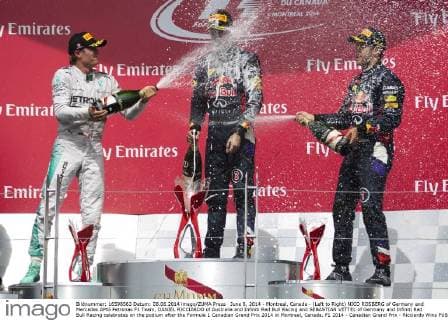 June 8, 2014 - Montreal, Canada - (Left to Right) NICO ROSBERG of Germany and Mercedes AMG Petronas F1 Team, DANIEL RICCIARDO of Australia and Infiniti Red Bull Racing and SEBASTIAN VETTEL of Germany and Infiniti Red Bull Racing celebrates on the podium after the Formula 1 Canadian Grand Prix 2014 in Montreal, Canada. F1 2014 - Canadian Grand Prix - Ricciardo Wins  - ZUMAg14