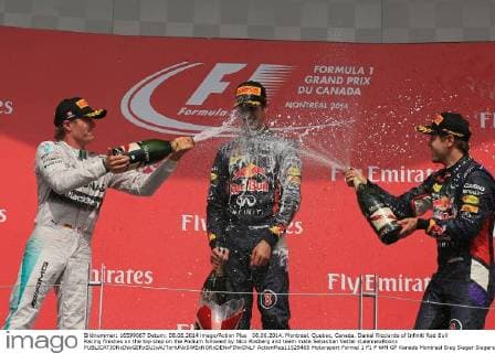 08.06.2014. Montreal, Quebec, Canada. Daniel Ricciardo of Infiniti Red Bull Racing finishes on the top step on the Podium followed by Nico Rosberg and team mate Sebastian Vettel xLeannexBoonx  ActionPlus11529465