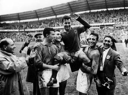 1958 World Cup 3rd Place Playoff France v West Germany Just Fontaine of France is carried by his team mates (L-R) Yvon Douis, Andre Lerond and Jean Vincent after scoring four goals against West Germany and becoming the World Cup top scorer with thirteen goals. France won the match 6-3 in Gothenburg. 28th June 1958  kbdig quer UnitedArchives01028216