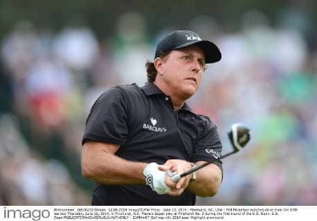 June 12, 2014 - Pinehurst, NC, USA - Phil Mickelson watches drive from the 13th tee box Thursday, June 12, 2014, in Pinehurst, N.C. Players began play at Pinehurst No. 2 during the first round of the U.S. Open. U.S. Open - ZUMAm67