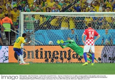 Neymar of Brazil scores his side s second goal from the penalty spot during the 2014 FIFA World Cup Group A match at the Arena Corinthians in Sao Paulo, Brazil on June 12, 2014.  SAO2014061209