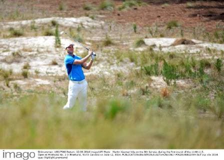 Martin Kaymer hits on the 8th fairway during the first round of the 114th U.S. Open at Pinehurst No. 2 in Pinehurst, North Carolina on June 12, 2014.  PIN20140612349