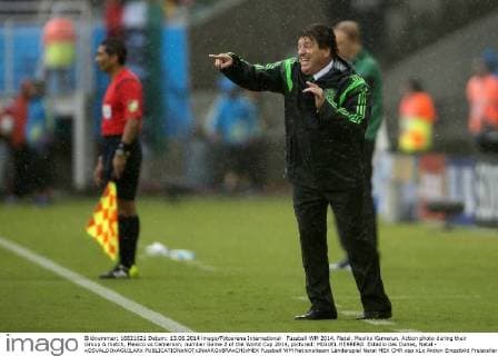 Fussball WM 2014. Natal. Mexiko Kamerun. Action photo during their Group A match, Mexico vs Cameroon, number Game 2 of the World Cup 2014, pictured: MIGUEL HERRERA Estadio das Dunas, Natal - xOSVALDOxAGUILARx 