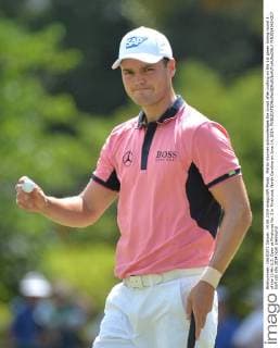 Martin Kaymer acknowledges the crowd after putting on the 1st green during round 3 of the 114th U.S. Open at Pinehurst No. 2 in Pinehurst, North Carolina on June 14, 2014.  PIN20140614317