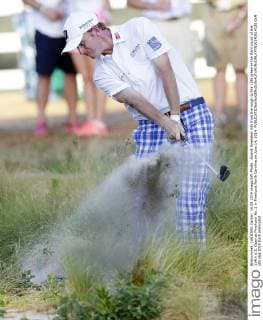 Brandt Snedeker hits from the rough to the 18th green in the third round of the 114th U.S. Open at Pinehurst No. 2 in Pinehurst North Carolina on June 14, 2014.  PIN20140614130