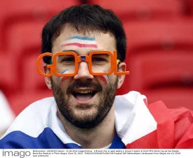 A French Fan is seen before a Group E match of 2014 FIFA World Cup at the Estadio Beira-Rio Stadium in Porto Alegre, June 15, 2014. 