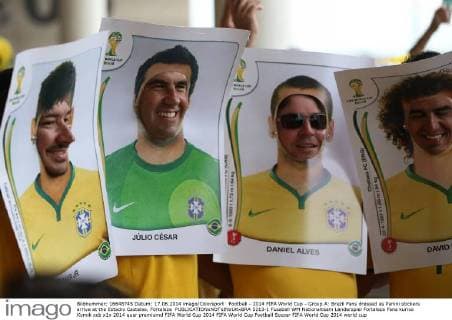 Football - 2014 FIFA World Cup - Group A: Brazil Fans dressed as Panini stickers arrive at the Estadio Castelao, Fortaleza  5213-1
