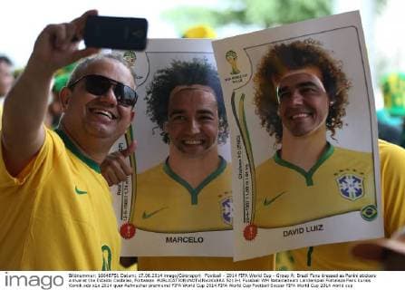 Football - 2014 FIFA World Cup - Group A: Brazil Fans dressed as Panini stickers arrive at the Estadio Castelao, Fortaleza  5213-1