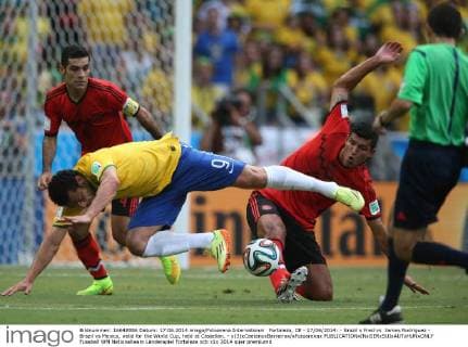 Fortaleza, CE - 17 06 2014: - Brazil s Fred vs James Rodriguez - Brazil vs Mexico, valid for the World Cup, held at Castellan. - x(3)xCaetanoxBarreirax xFotoarenax 