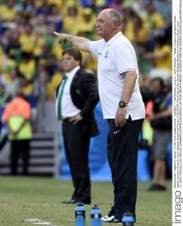 (140617) -- FORTALEZA, June 17, 2014 (Xinhua) -- Brazil s coach Luiz Felipe Scolari reacts during a Group A match between Brazil and Mexico of 2014 FIFA World Cup at the Estadio Castelao Stadium in Fortaleza, Brazil, June 17, 2014.(Xinhua Lui Siu Wai)(rh) (SP)BRAZIL-FORTALEZA-WORLD CUP 2014-GROUP A-BRAZIL VS MEXICO 