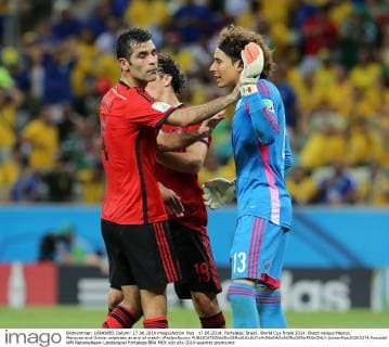 17.06.2014. Fortaleza, Brazil. World Cup finals 2014. Brazil versus Mexico. Marquez and Ochoa celebrate at end of match xPaoloxNuccix  ActionPlus20203274