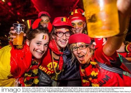 BRUSSELS, BELGIUM: Belgium s supporters celebrate at the Antwerp Sportpaleis during the viewing on a big screen of the soccer game played in Belo Horizonte, the first game in Group H of the first round of the 2014 FIFA World Cup, Tuesday 17 June 2014. 